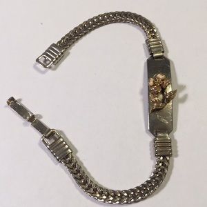 Vintage Delma silver bracelet with flower